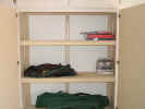 adjustable shelf for storage cabinet